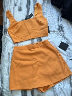Lulu's Bright Orange Two-Piece Crop Top & Skort Set